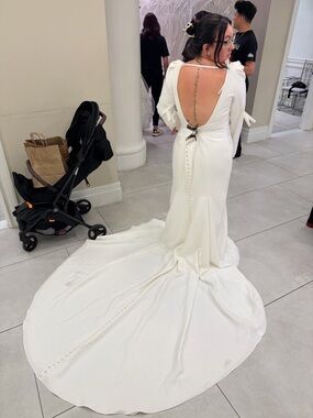 Paloma Blanca White Satin Long Sleeve Open-Back Wedding Gown with Train